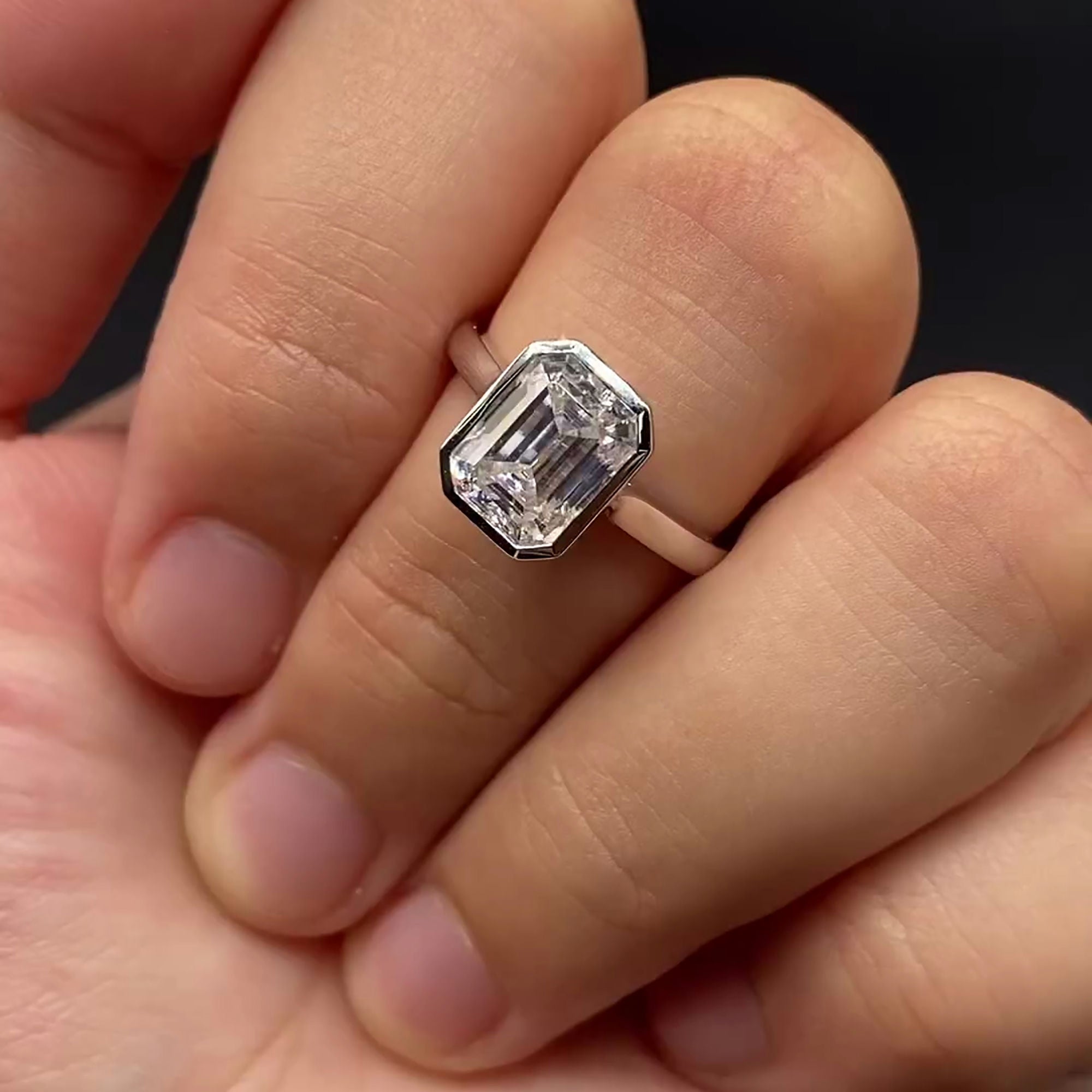 Emerald Cut Lab Grown Diamond Ring with Bezel Setting and High Profile