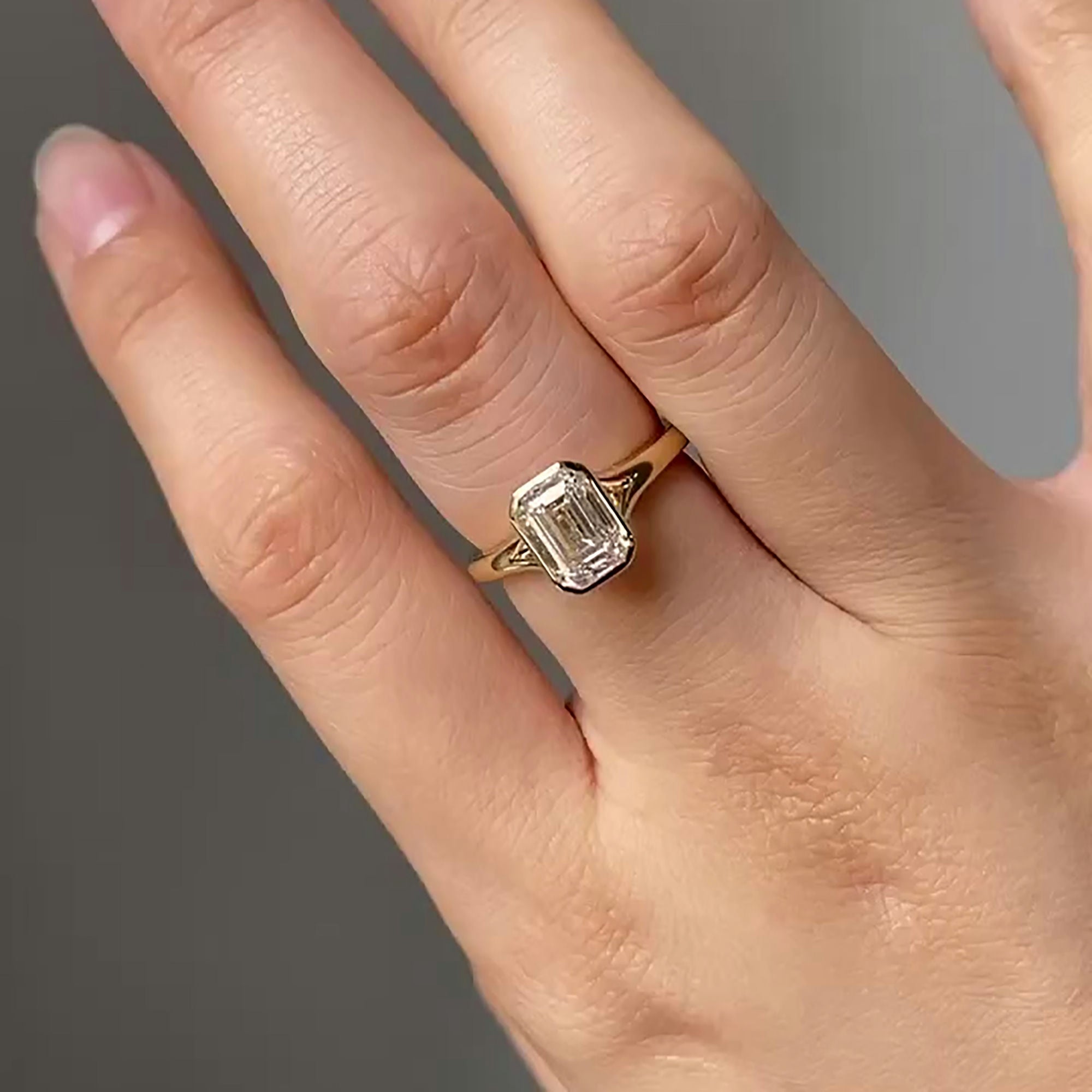 Emerald Cut Lab Grown Diamond Ring with Bezel Setting